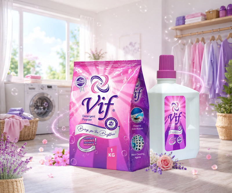 VIF detergent powder and VIF liquid detergent displayed in a bright clean laundry room with washing machine, pastel folded clothes, baskets, and fresh floral decor